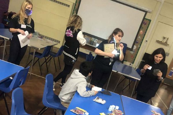 Engaging Refugees in Photonics Public Engagement